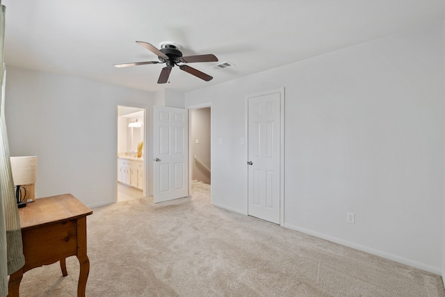 6615 Ampton Dr, Spring, TX 77379 - unfurnished bedroom featuring carpet floors, baseboards, ensuite bathroom, and a ceiling fan
