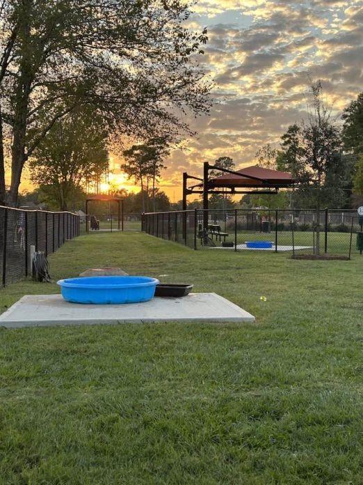 6615 Ampton Dr, Spring, TX 77379 - view of yard at dusk