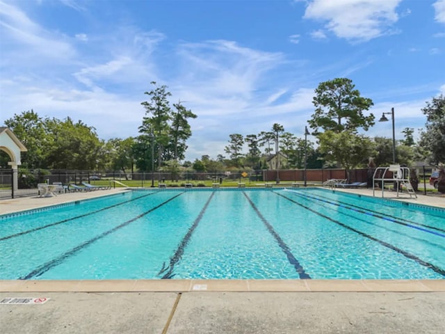 6615 Ampton Dr, Spring, TX 77379 - community pool featuring a patio area
