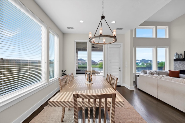 437 Ripple Edge Ct, Katy, TX 77493 - dining area with a chandelier, dark wood-style floors, plenty of natural light, and recessed lighting
