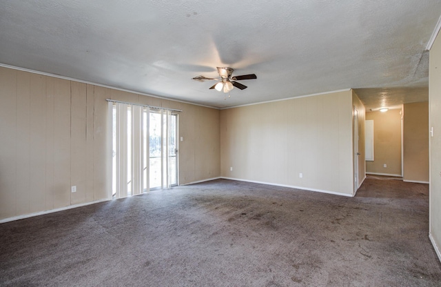 carpeted empty room with a textured ceiling, visible vents, a ceiling fan, and ornamental molding