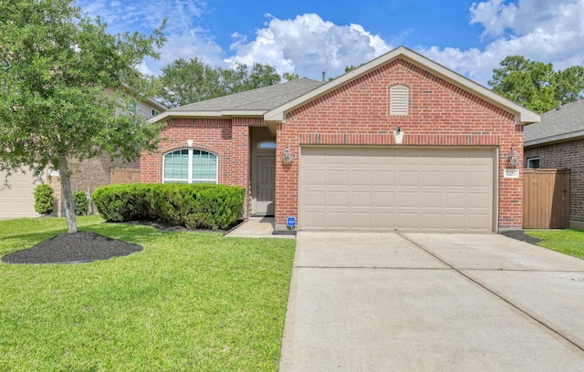 15226 Loys Coves Ct, Humble, TX 77396 - view of front of home featuring brick siding, a front yard, and an attached garage