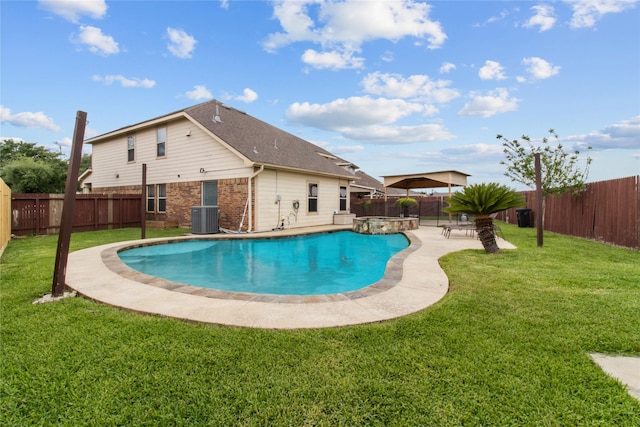 5443 Espuela Ln, Baytown, TX 77521 - view of pool featuring central AC unit, a patio, and a pool with connected hot tub
