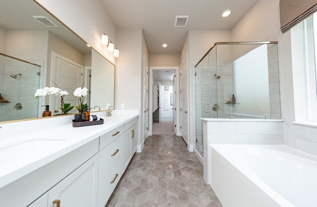 18715 Brego Ln, Tomball, TX 77377 - full bathroom with a bath, visible vents, a shower stall, and recessed lighting