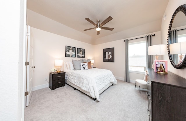 18715 Brego Ln, Tomball, TX 77377 - bedroom featuring light colored carpet, baseboards, and a ceiling fan