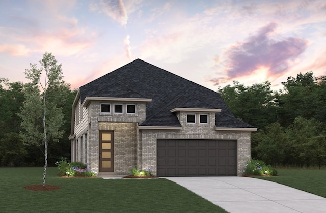 18715 Brego Ln, Tomball, TX 77377 - view of front of property with concrete driveway, a garage, brick siding, and a lawn