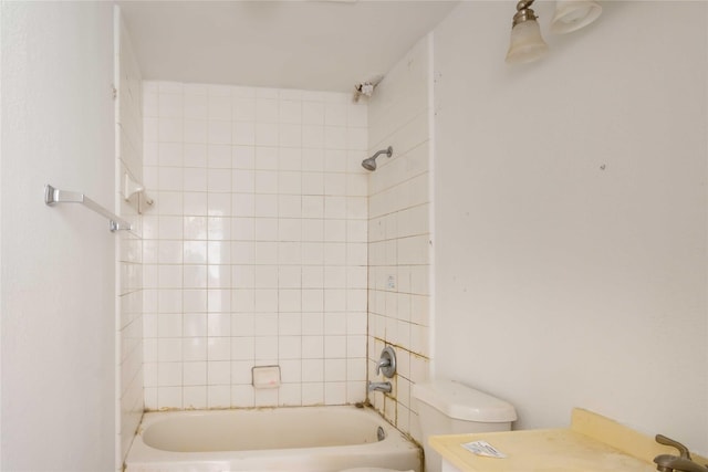 4411 Osage Dr, Baytown, TX 77521 - bathroom featuring toilet, bathing tub / shower combination, and vanity