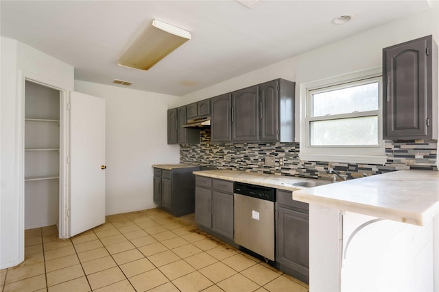 4411 Osage Dr, Baytown, TX 77521 - kitchen with dishwasher, visible vents, a sink, light countertops, and tasteful backsplash