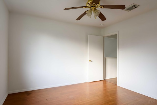 4411 Osage Dr, Baytown, TX 77521 - interior space with baseboards, a ceiling fan, visible vents, and wood finished floors