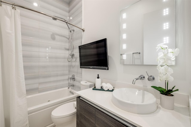full bath featuring toilet, shower / tub combo, and vanity