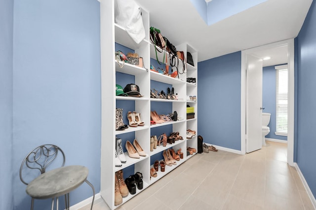 7655 S Braeswood Blvd Unit 10, Houston, TX 77071 - sitting room featuring tile patterned floors and baseboards