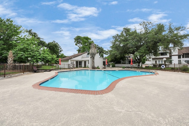 7655 S Braeswood Blvd Unit 10, Houston, TX 77071 - community pool featuring a patio area and fence