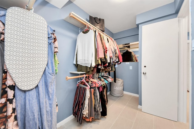 7655 S Braeswood Blvd Unit 10, Houston, TX 77071 - spacious closet with tile patterned floors