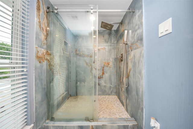 7655 S Braeswood Blvd Unit 10, Houston, TX 77071 - bathroom featuring a marble finish shower