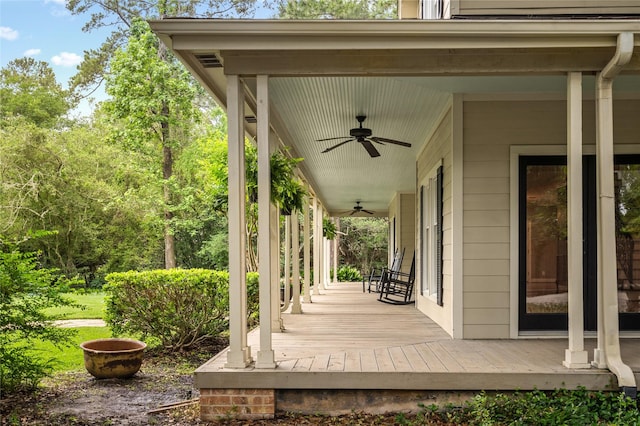 wooden terrace with ceiling fan