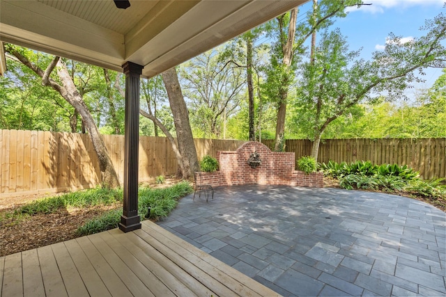 view of patio / terrace featuring a fenced backyard and ceiling fan