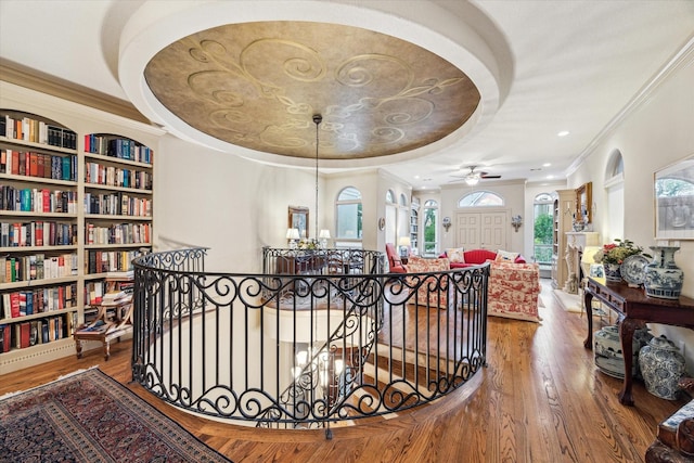 6417 Rodrigo St, Houston, TX 77007 - hall with an upstairs landing, wood finished floors, ornamental molding, and a chandelier
