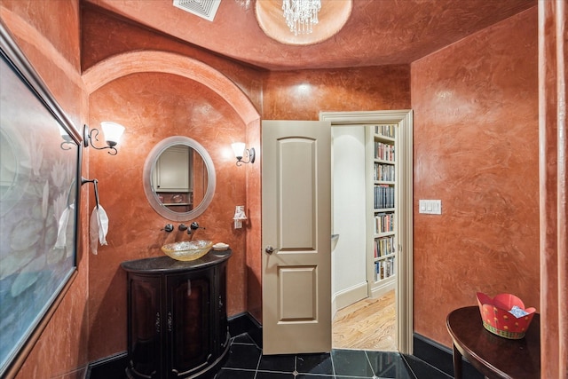 6417 Rodrigo St, Houston, TX 77007 - bathroom with tile patterned flooring and vanity