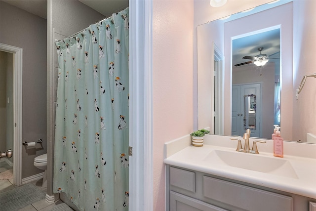 full bathroom featuring toilet, a shower with curtain, vanity, tile patterned flooring, and ceiling fan