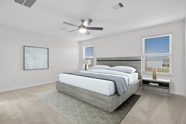 8114 Shelter Bay Ln, Cypress, TX 77433 - bedroom featuring carpet flooring, visible vents, baseboards, and a ceiling fan
