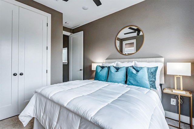 bedroom with carpet flooring, a closet, and ceiling fan
