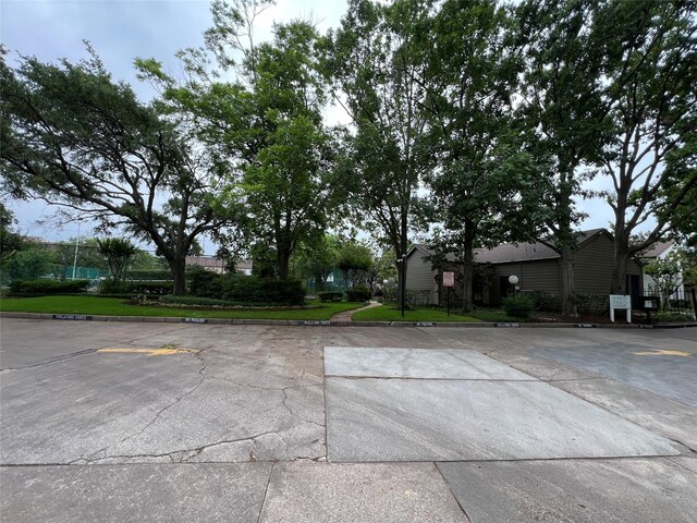 view of road featuring curbs