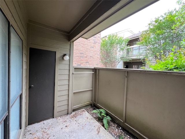 view of patio with a balcony