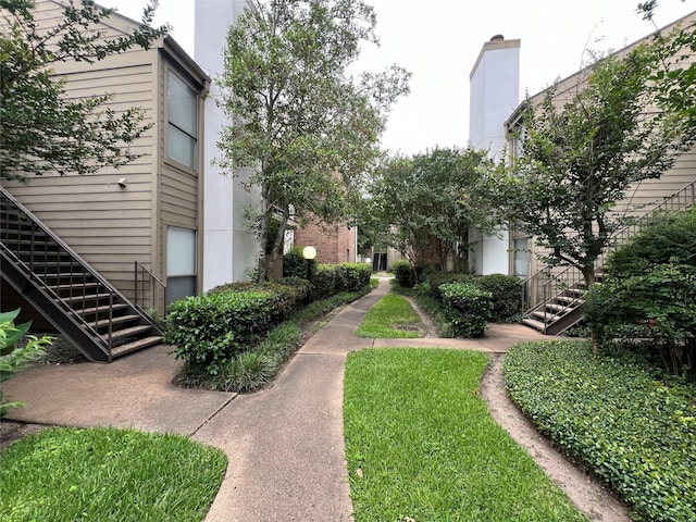 view of home's community with stairway