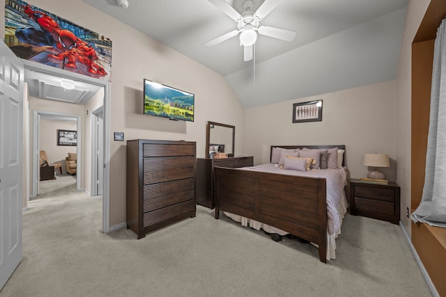 bedroom with vaulted ceiling, ceiling fan, carpet flooring, and baseboards