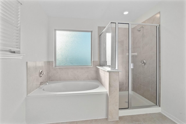 7611 Coral Key Dr, Cypress, TX 77433 - full bath featuring a bath, tile patterned flooring, and a shower stall
