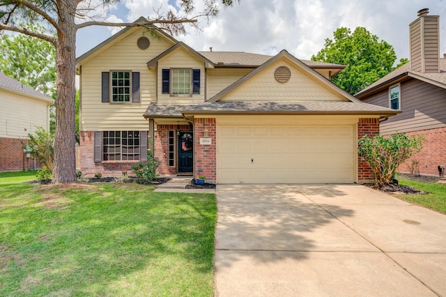 traditional home featuring a front lawn, driveway, brick siding, and a garage