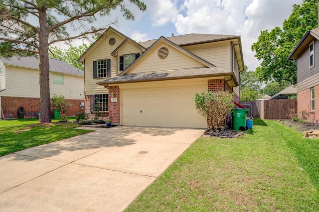 traditional-style house with an attached garage, fence, a front lawn, brick siding, and driveway