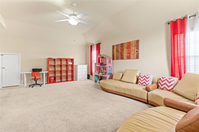 carpeted living room featuring lofted ceiling and ceiling fan