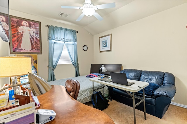 home office with carpet floors, visible vents, baseboards, ceiling fan, and vaulted ceiling