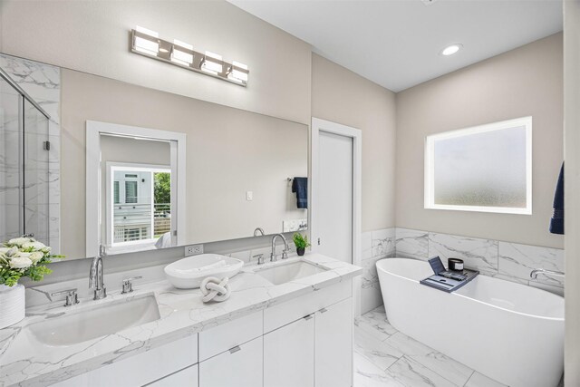 855 Prosper St, Houston, TX 77088 - bathroom featuring a sink, a shower stall, and marble finish floor