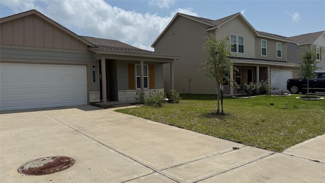 117 Avalon Dr, Huntsville, TX 77320 - traditional-style house with an attached garage, concrete driveway, board and batten siding, a shingled roof, and a front yard