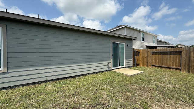 117 Avalon Dr, Huntsville, TX 77320 - back of house featuring a yard and fence