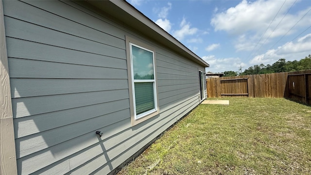 117 Avalon Dr, Huntsville, TX 77320 - view of property exterior featuring a yard and fence
