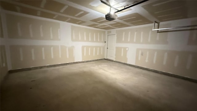 117 Avalon Dr, Huntsville, TX 77320 - garage featuring a garage door opener