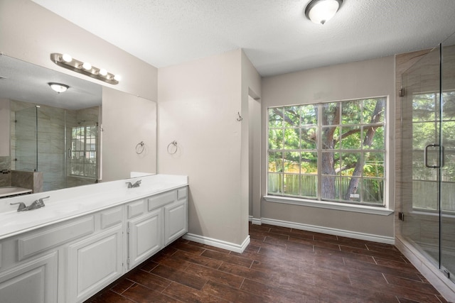 12522 Bent Pine Dr, Cypress, TX 77429 - full bath with plenty of natural light, baseboards, a shower stall, and a sink