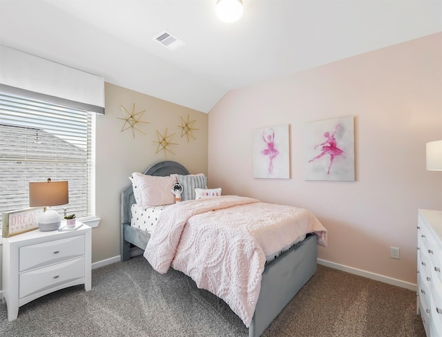 carpeted bedroom with visible vents, baseboards, and lofted ceiling