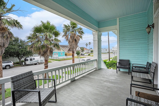 balcony with a porch and a residential view