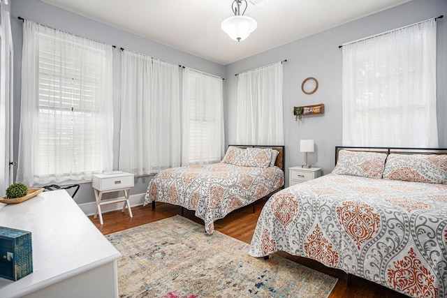 bedroom featuring wood finished floors