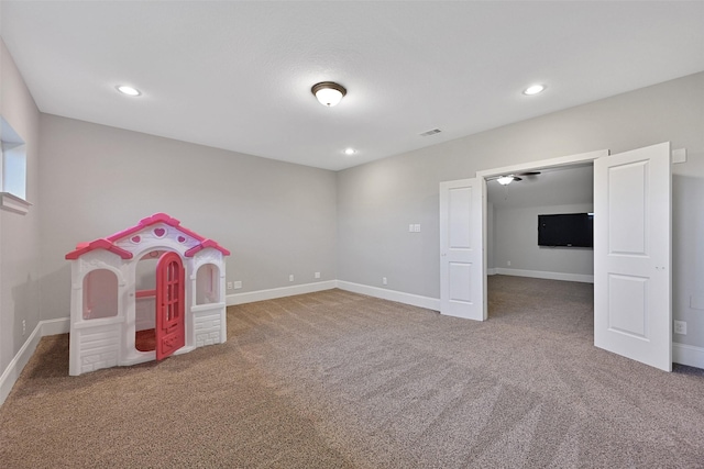 rec room with carpet flooring, visible vents, baseboards, and recessed lighting