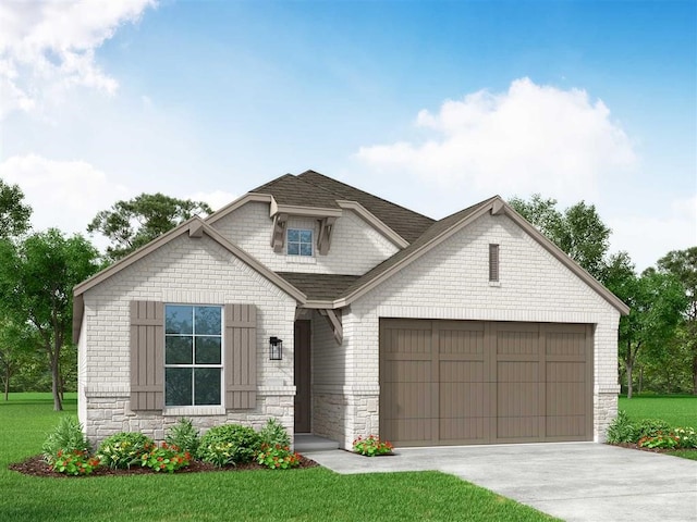 view of front of home featuring an attached garage, a front lawn, stone siding, and driveway