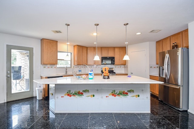 kitchen with a sink, stainless steel appliances, visible vents, light countertops, and granite finish floor
