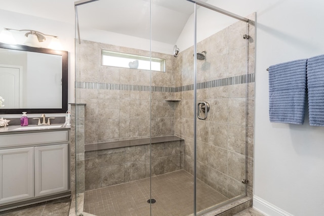 29411 Barker Meadow Ln, Katy, TX 77494 - full bathroom featuring a stall shower, vanity, and lofted ceiling