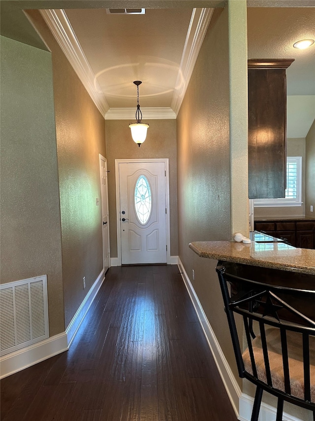 23196 J E B Cir, Frankston, TX 75763 - foyer with crown molding, baseboards, a textured wall, and dark wood finished floors