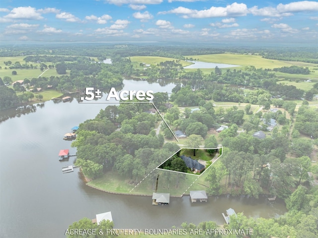 23196 J E B Cir, Frankston, TX 75763 - aerial view of property and surrounding area with a large body of water, property boundaries highlighted, and a tree filled landscape