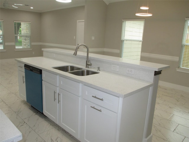 721 E Fayle St, Baytown, TX 77520 - kitchen featuring dishwashing machine, an island with sink, a sink, white cabinetry, and marble finish floor